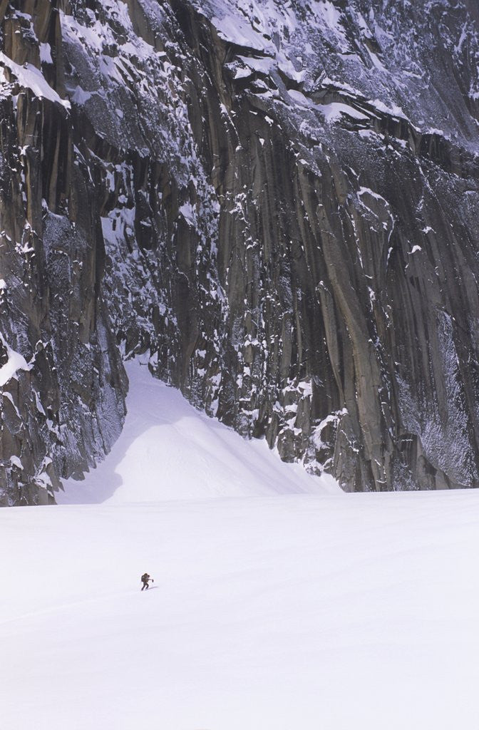 Detail of Backcountry Skier Underneath Snowpatch Spire, Bugaboos, British Columbia, Canada. by Anonymous
