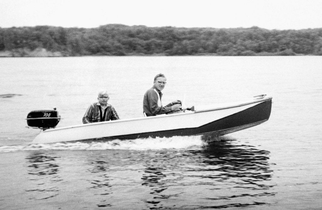 Detail of Two brothers speed by in a motor boat on a Wisconsin lake, ca. 1956 by Anonymous