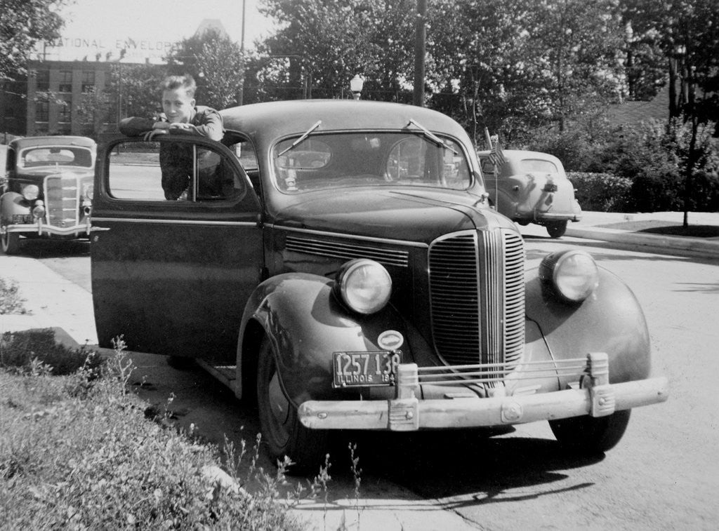 Detail of Eighteen year old boy with his first car, ca. 1944 by Anonymous