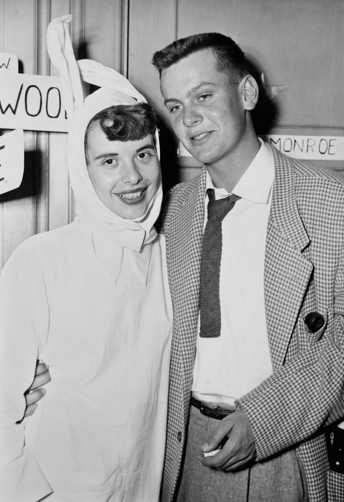 Detail of A couple on a date at a costume party pose, ca. 1955 by Anonymous