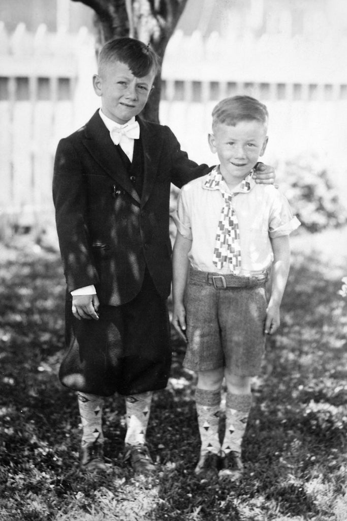 Detail of Two brothers pose in the backyard, ca. 1930 by Anonymous