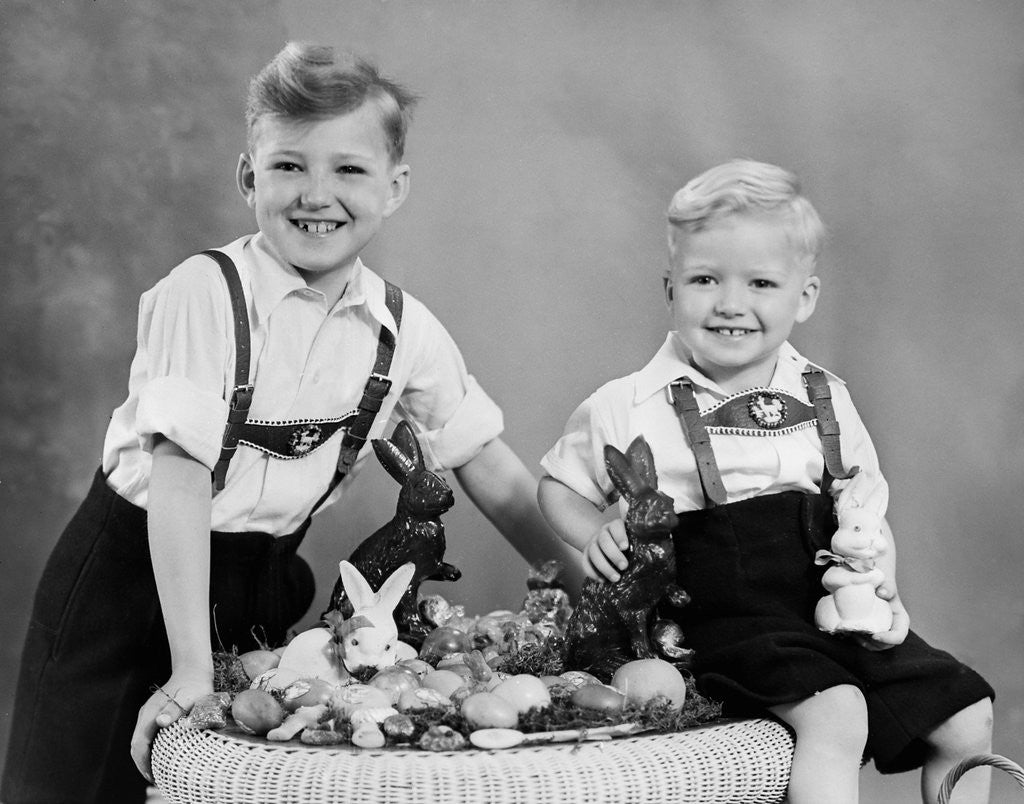 Detail of Two brothers sit with Easter decorations, ca. 1948 by Anonymous