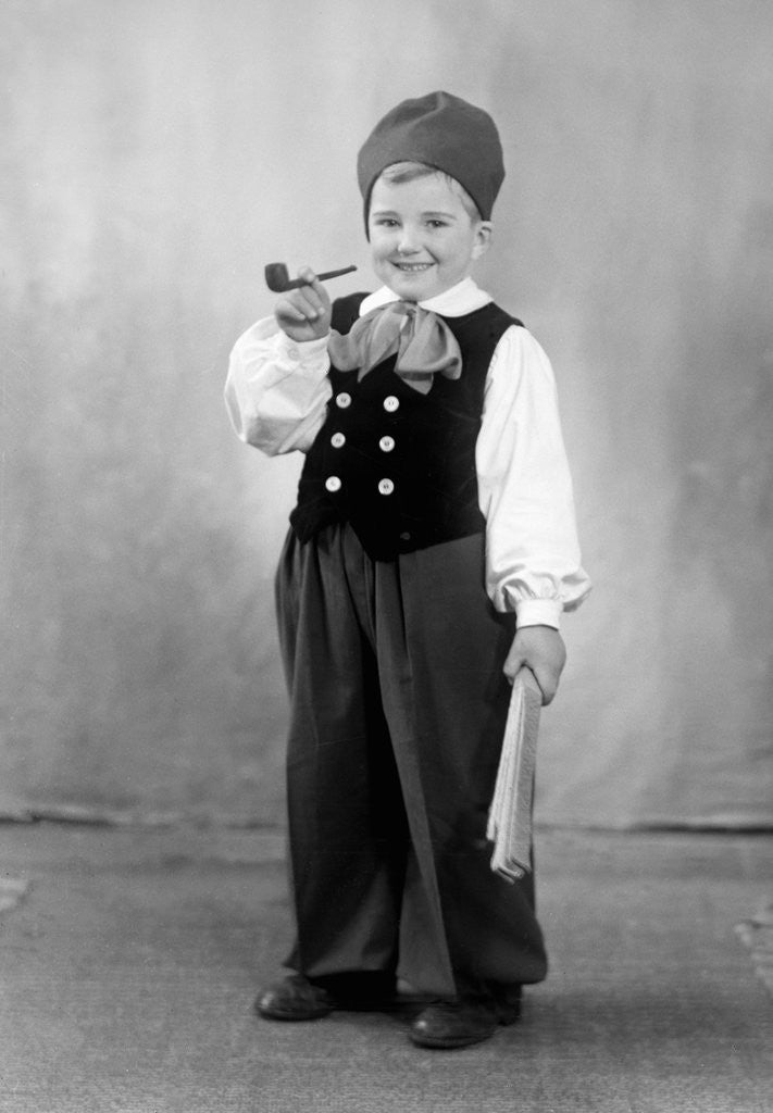 Detail of Six year old boy in Bavarian costume holds a pipe, ca. 1947 by Anonymous