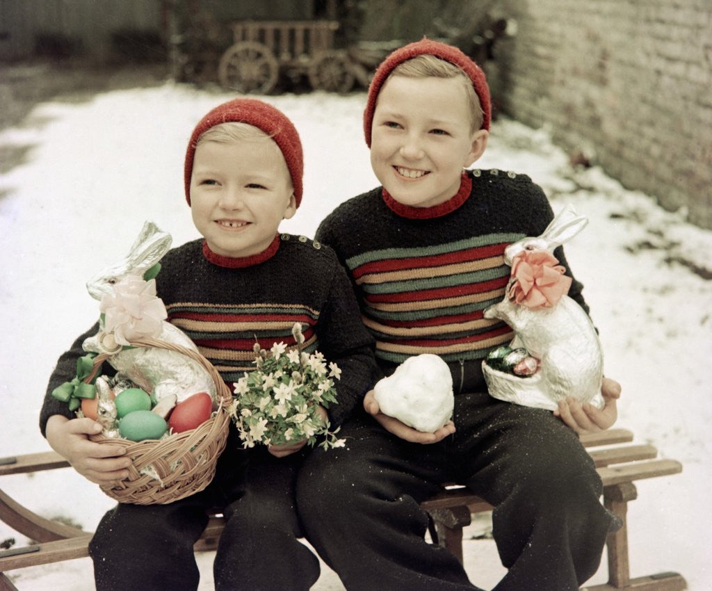 Detail of Two brothers sit with Easter decorations outside in Germany, ca. 1948 by Anonymous