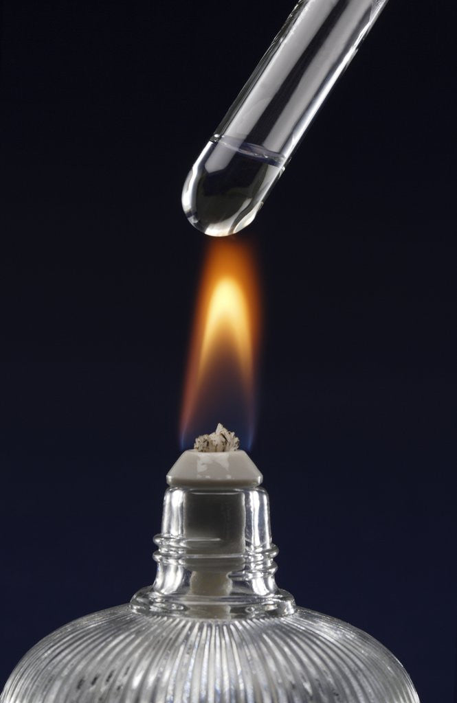 Detail of Test tube with liquid, over flame by Anonymous