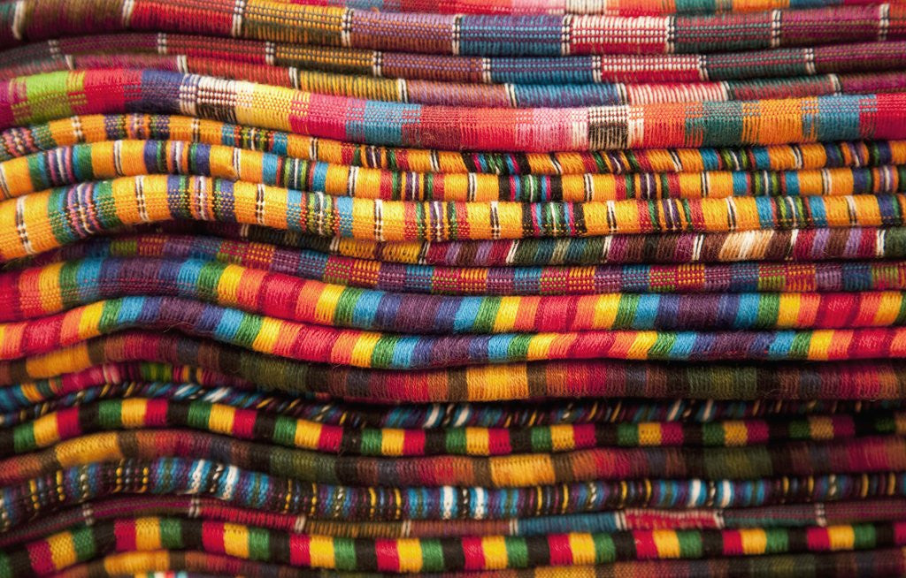 Detail of Textiles for sale in market in San Miguel de Allende by Corbis
