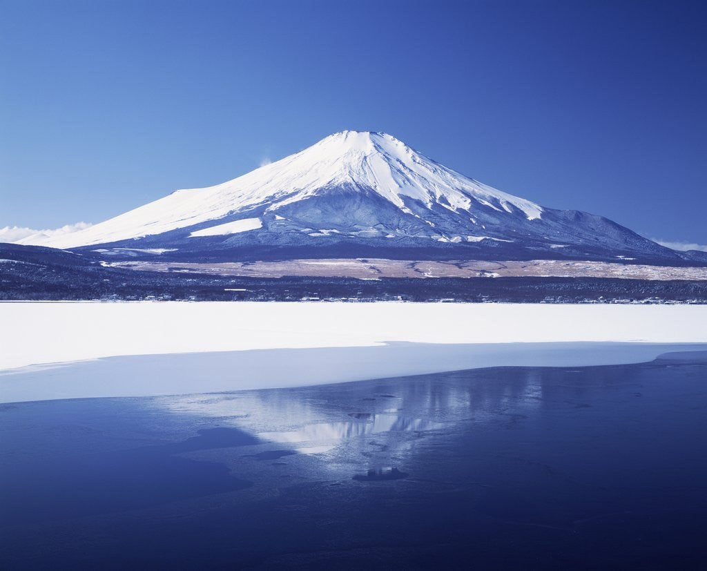 Detail of Mt. Fuji reflected in Yamanakako Lake at winter, Yamanashi Prefecture, Japan by Corbis