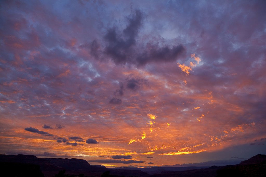 Detail of Colored clouds above Colorado River at sunset by Anonymous