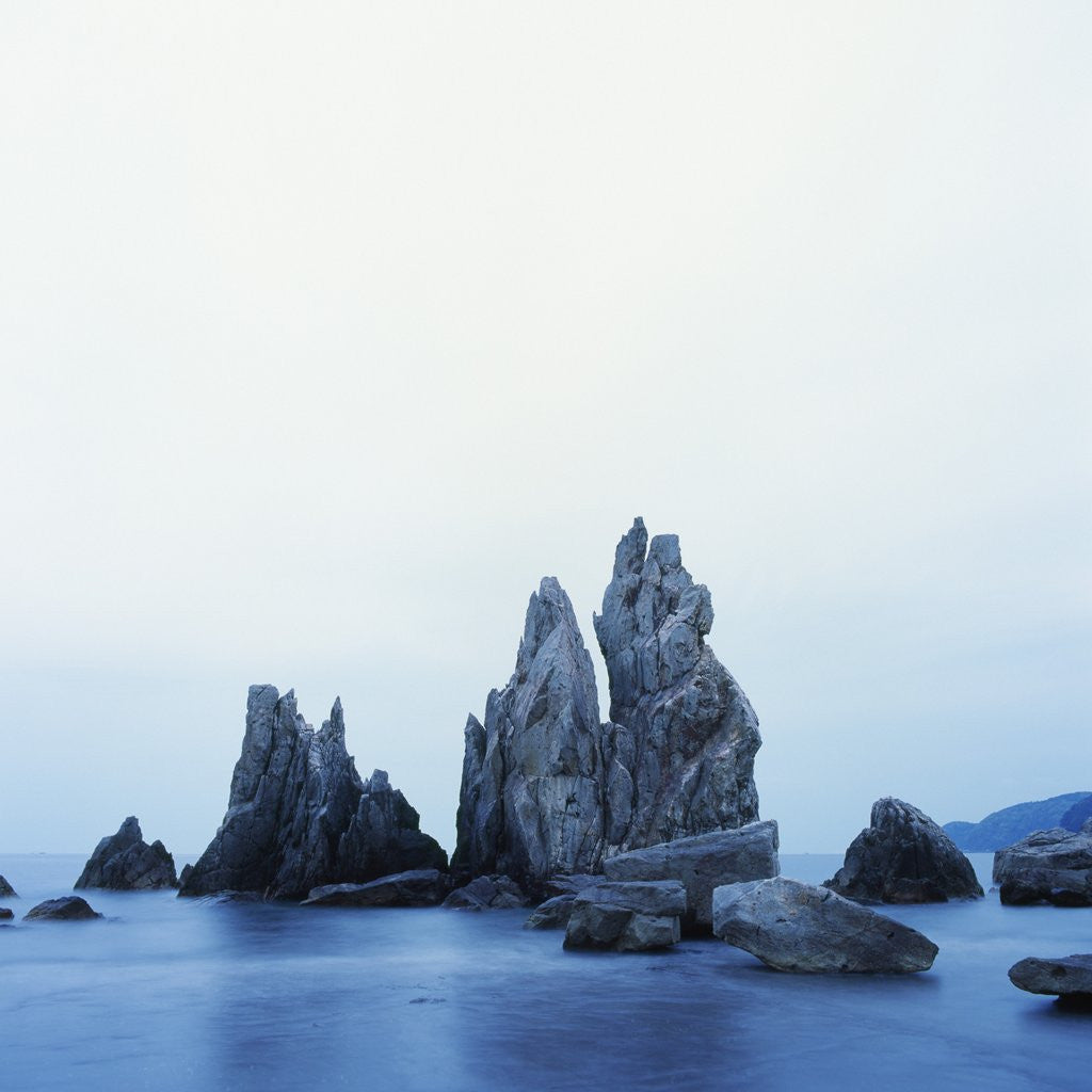 Detail of Dramatically Shaped Sea Stacks in Ocean by Corbis