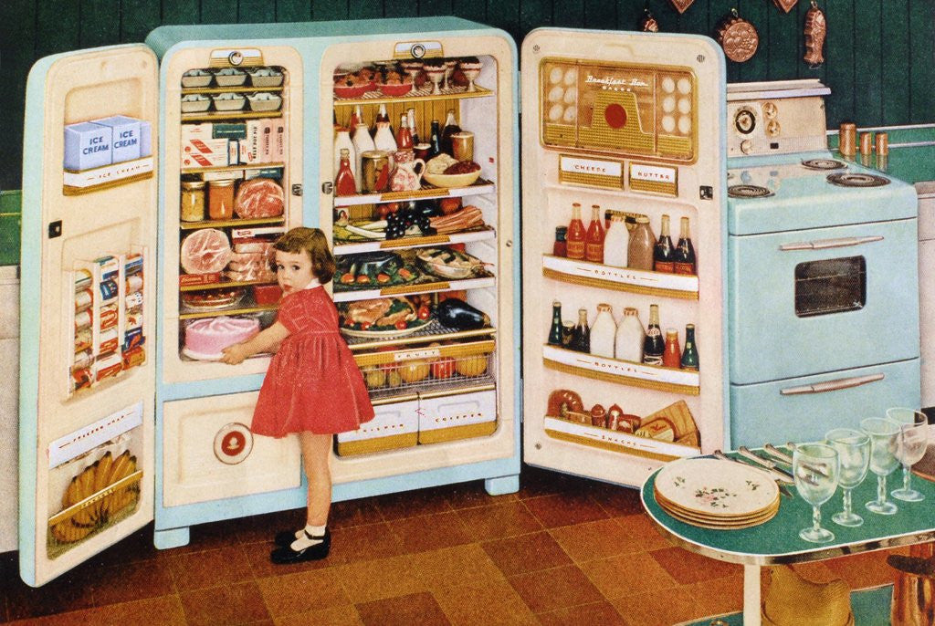 Detail of Girl standing near open refrigerator by Corbis