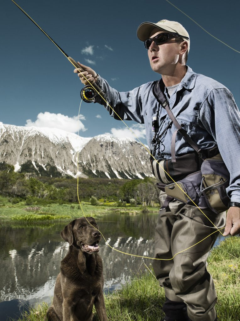 Detail of Man fly fishing with dog by Anonymous
