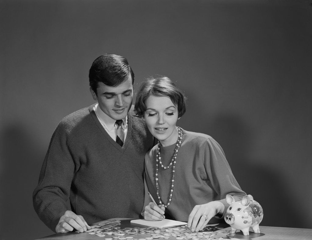 Detail of Couple counting coins from piggy bank by Anonymous