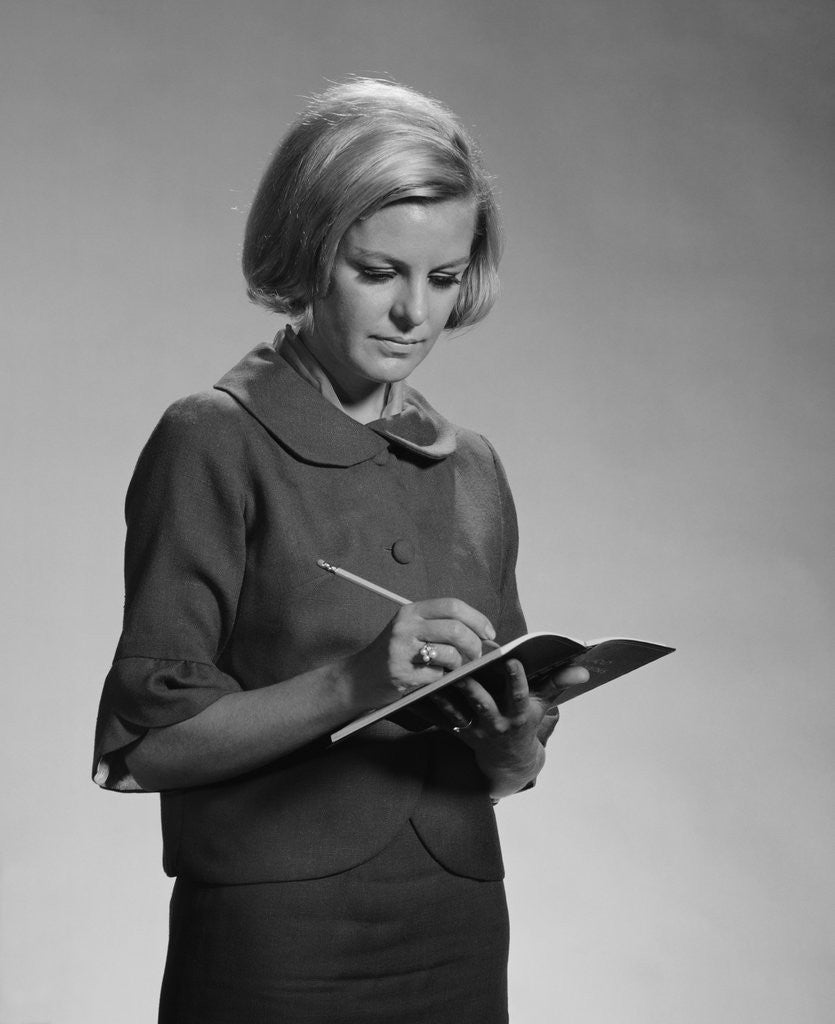 Detail of Blond woman secretary teacher taking notes by Anonymous