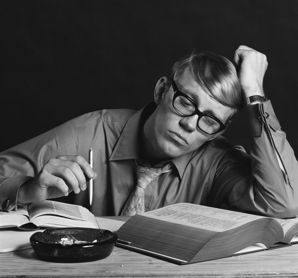 Detail of Young man studying reading books leaning on arm by Anonymous