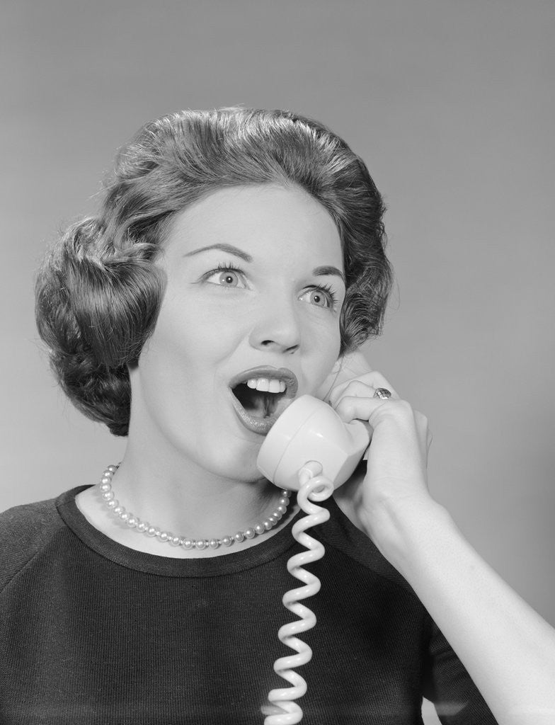 Detail of Excited woman talking on telephone by Anonymous