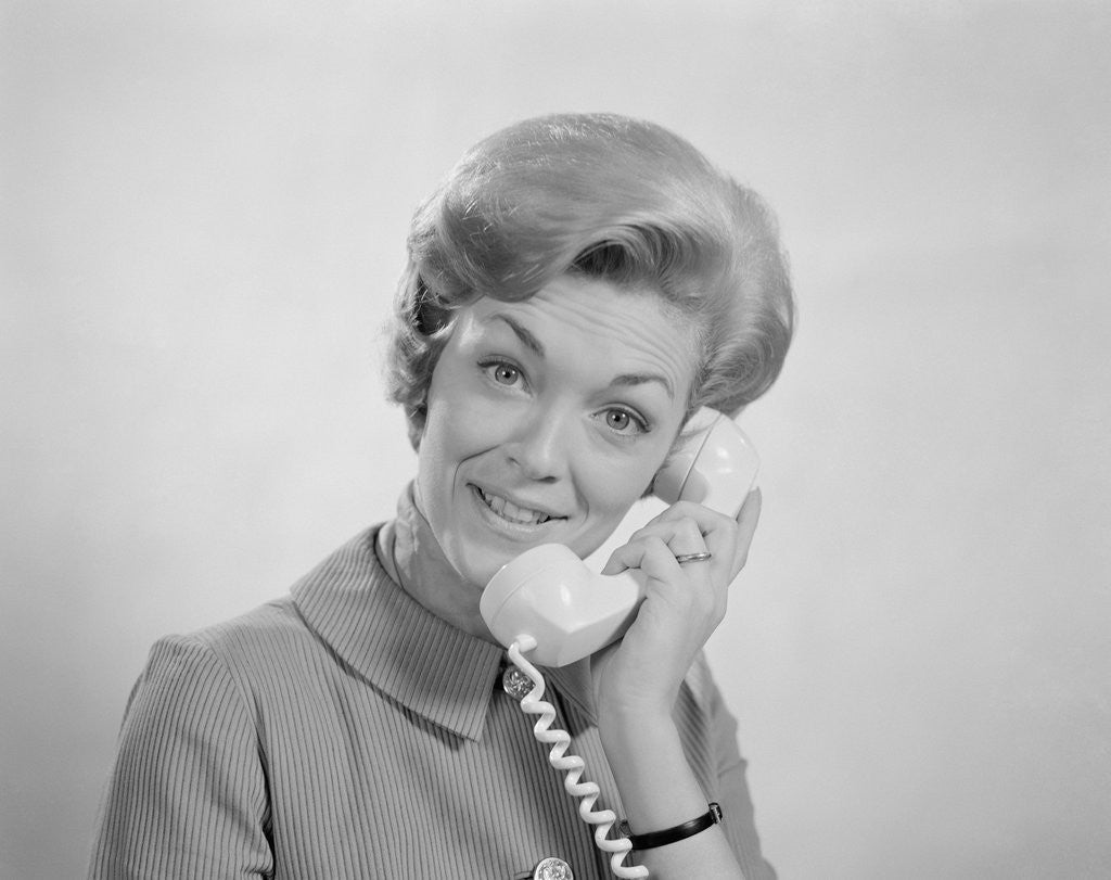 Detail of Portrait smiling woman talking on telephone by Anonymous