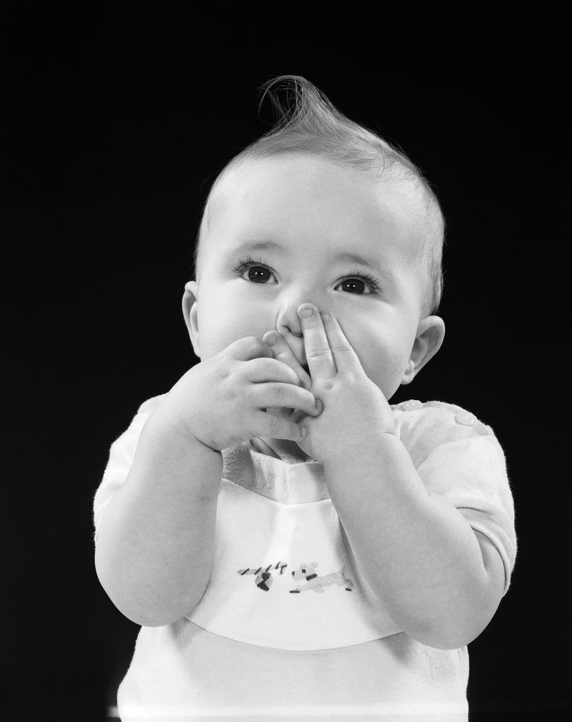 Detail of Portrait of baby covering mouth with hands fingers by Anonymous