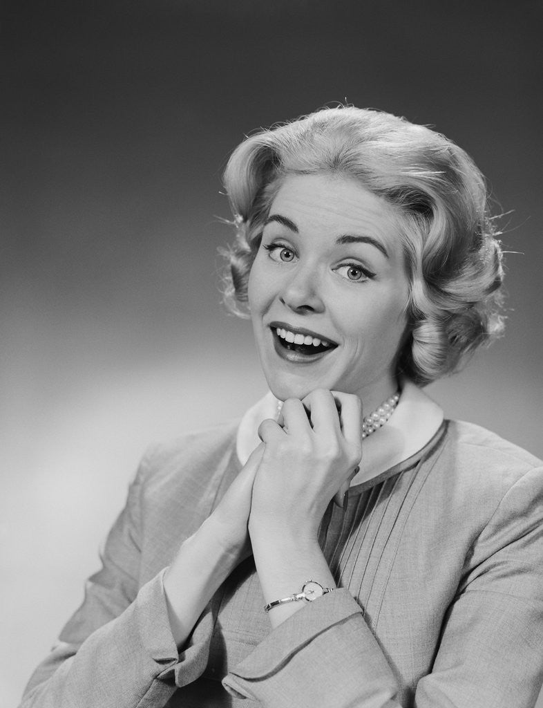 Detail of Woman clasped hand by chin with wishful hoping happy joyful facial expression by Anonymous