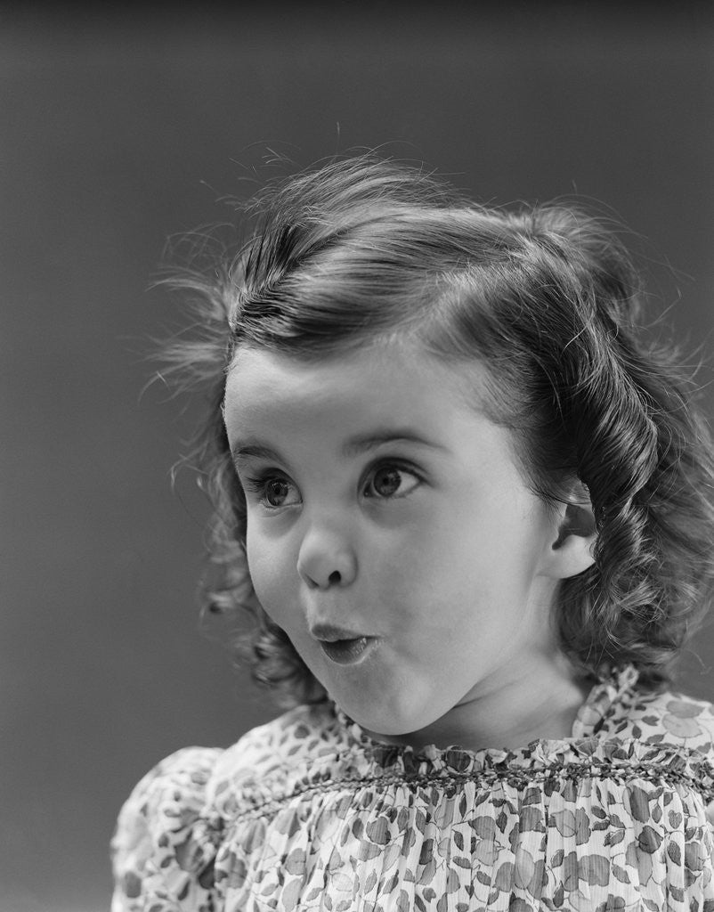 Detail of Portrait brunette little girl with surprised amazed facial expression by Anonymous