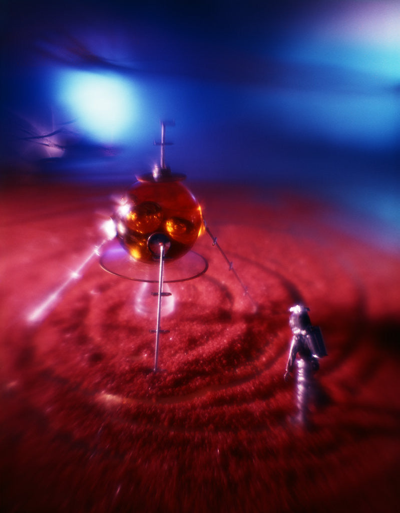 Detail of Silver space man astronaut alien walking in red sand to spacecraft by Anonymous