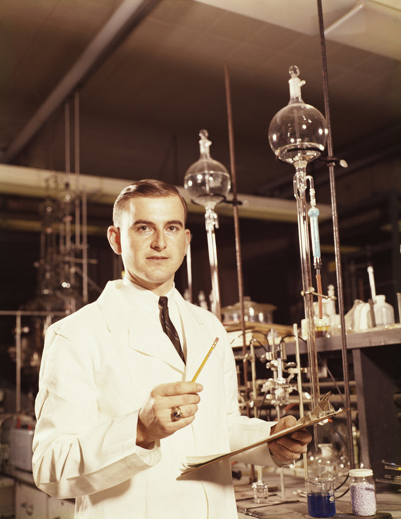 Detail of Scientist conducting a titration experiment by Anonymous