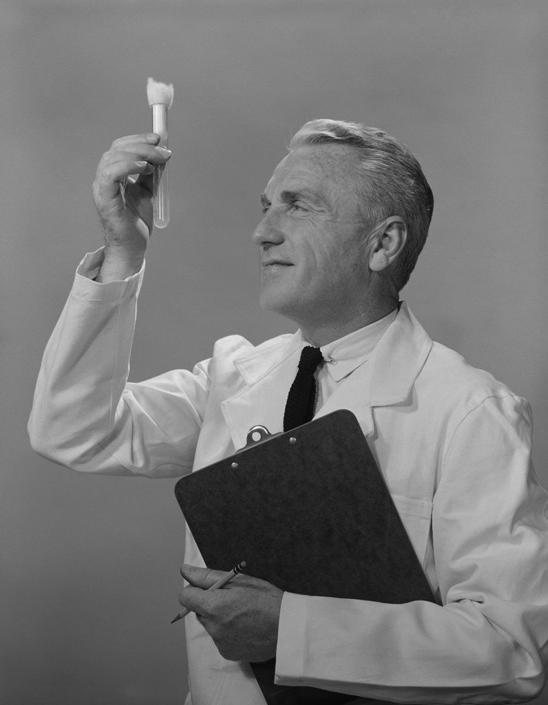 Detail of Man scientist studying test tube by Anonymous