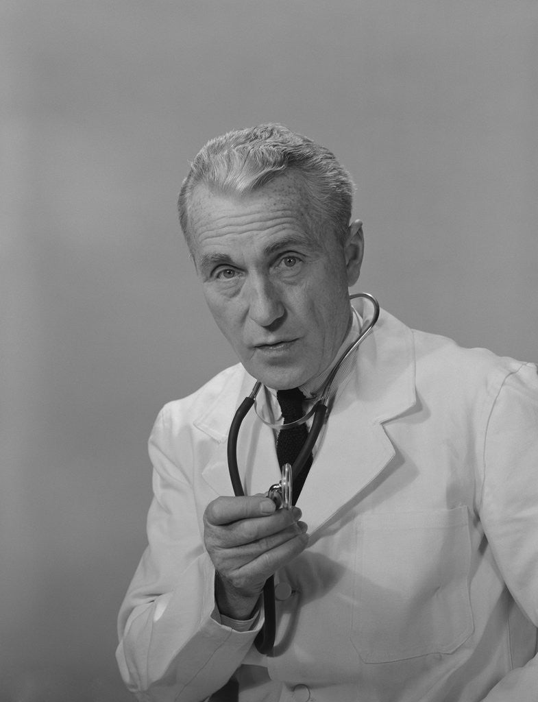 Detail of Male doctor holding stethoscope by Anonymous