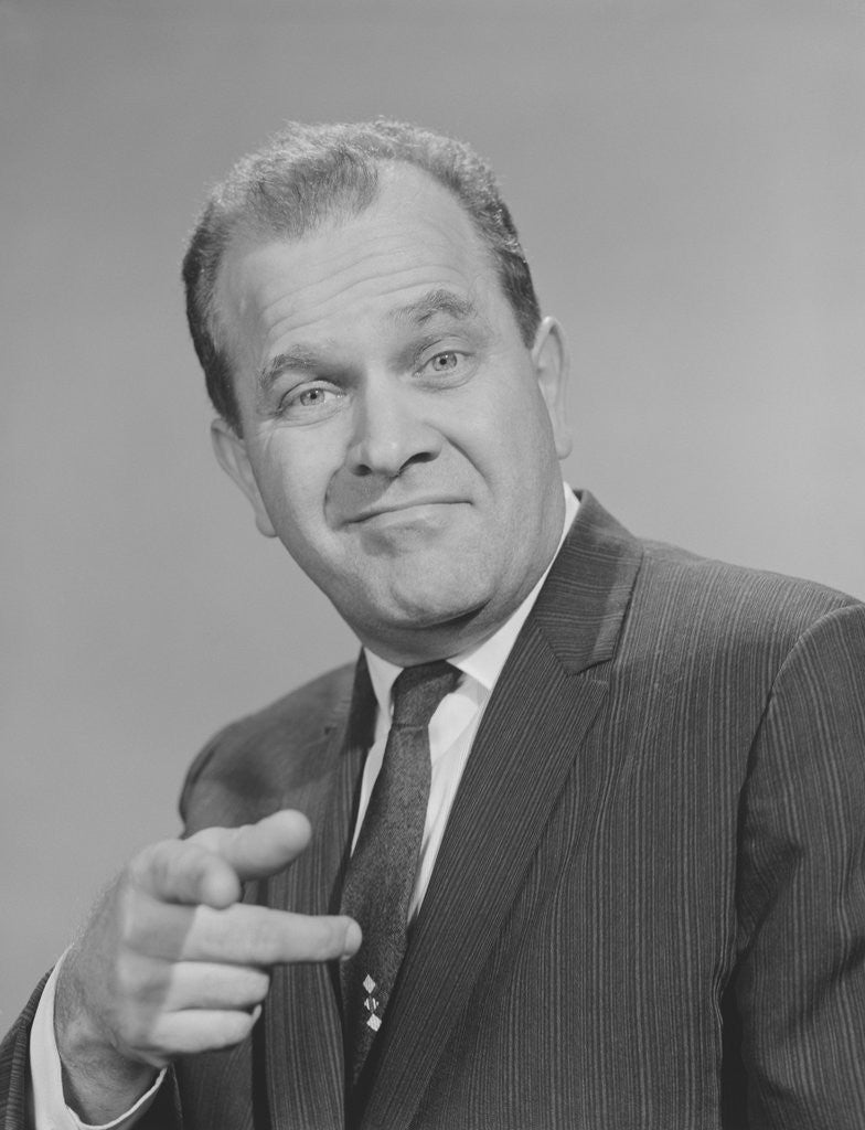 Detail of Portrait man pointing wearing suit tie smiling by Anonymous