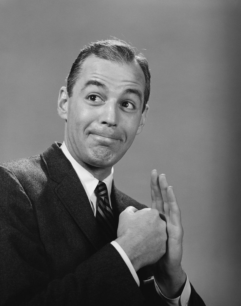 Detail of Man punching his fist into his palm with satisfied expression by Anonymous