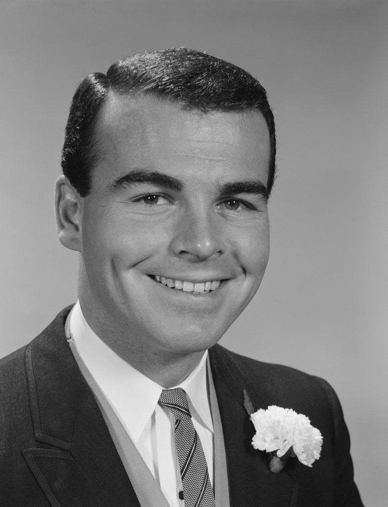 Detail of Smiling young man formal attire boutonniere in lapel bridegroom groom by Anonymous