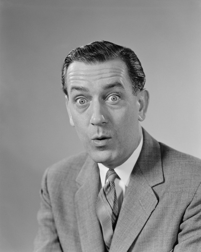 Detail of Businessman bulging eyes wide open shocked facial expression by Anonymous