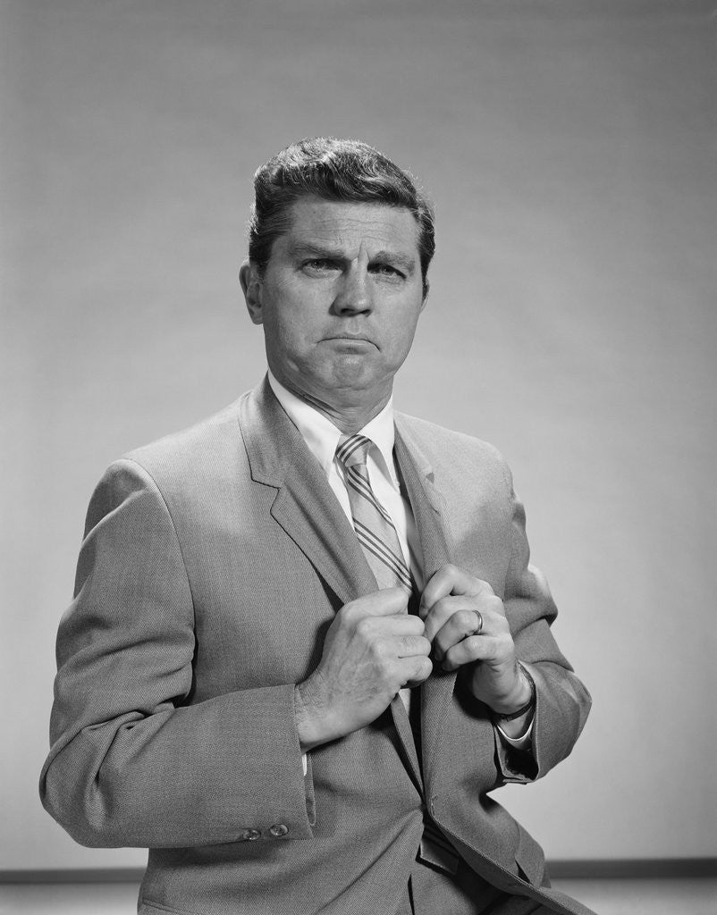 Detail of Portrait middle aged man stern serious expression hands gripping his lapels by Anonymous