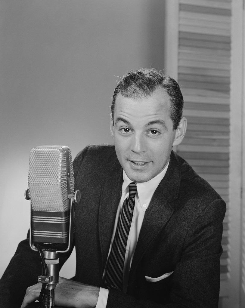 Detail of Man speaking into microphone radio tv announcer broadcaster by Anonymous
