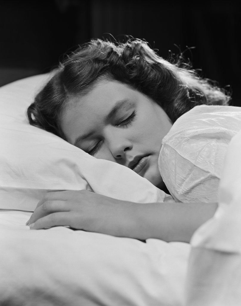 Detail of Girl sleeping head on pillow by Anonymous