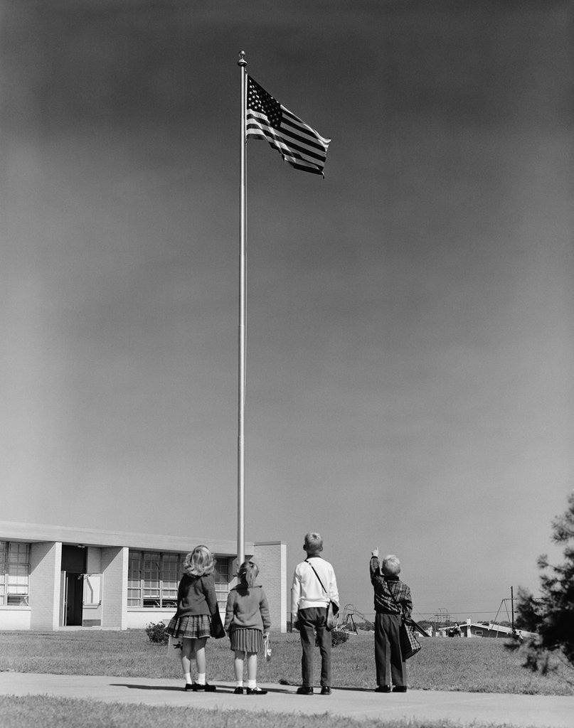 Detail of Group 4 school children looking up at american flag by Anonymous