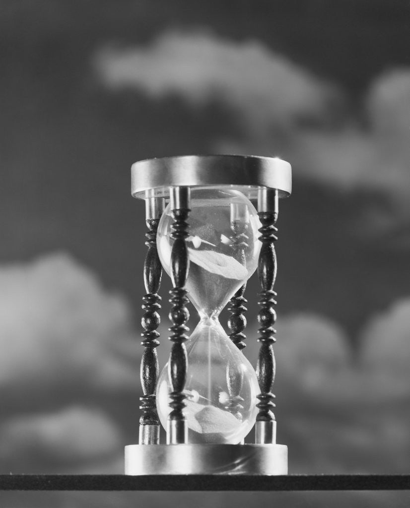 Detail of Hourglass against background of clouds by Anonymous