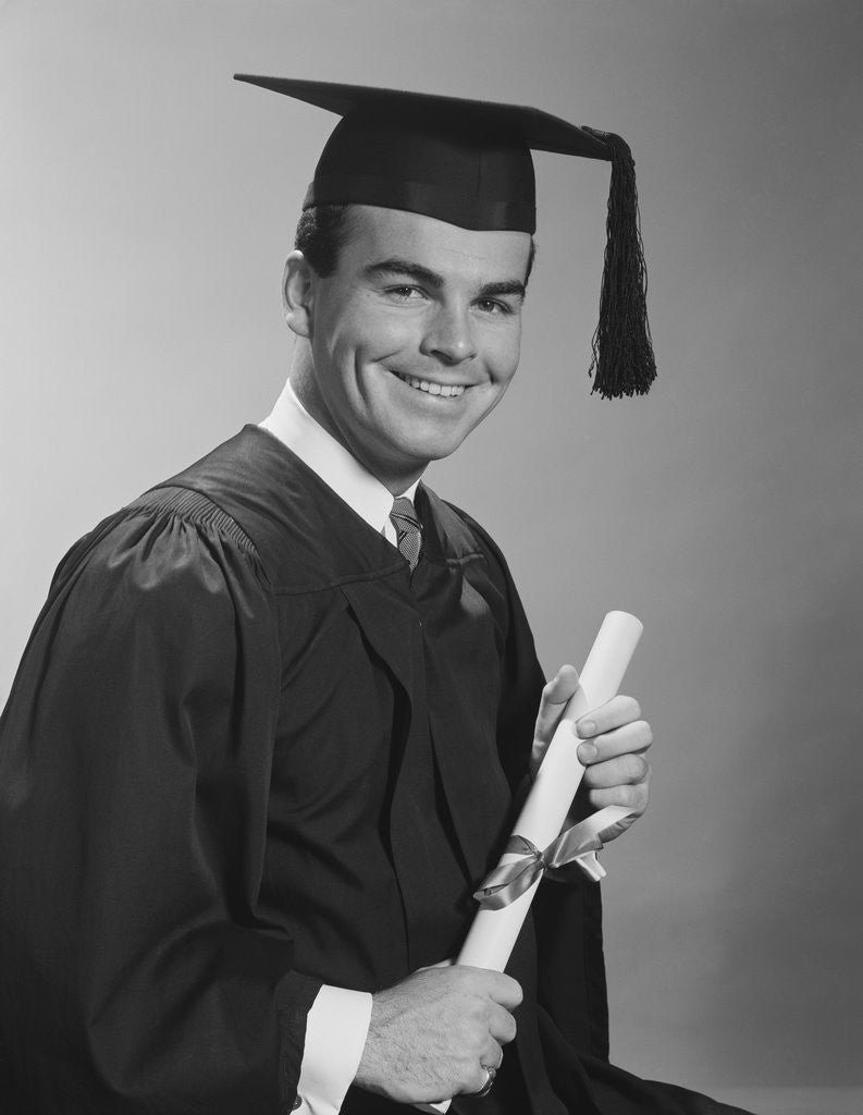Detail of Smiling man holding diploma wearing graduation robes by Anonymous