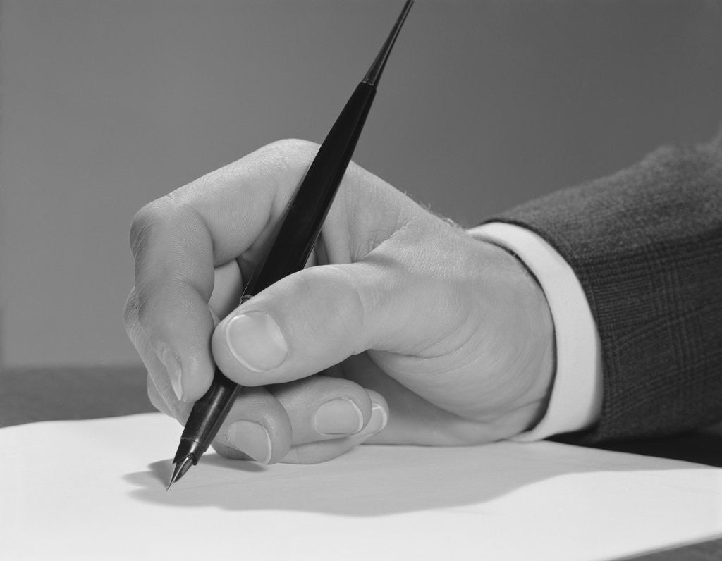 Detail of Male hand writing with fountain pen on blank paper by Anonymous