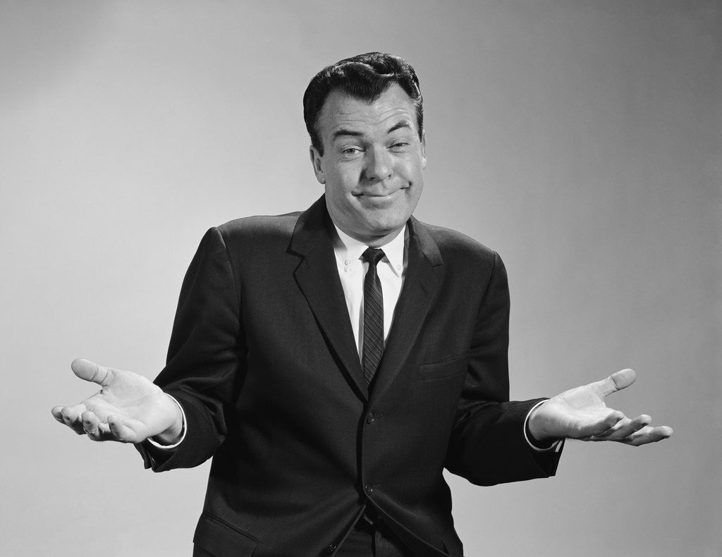 Detail of Business man shrugging his shoulders by Anonymous