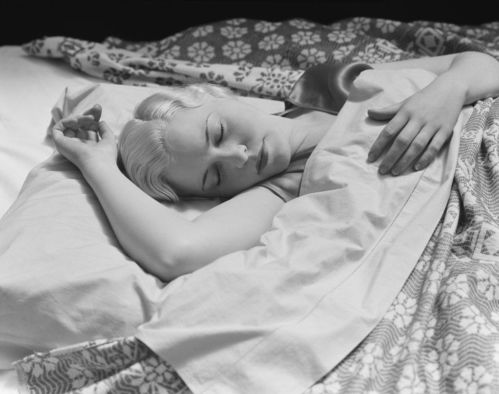 Detail of Sleeping blond woman hand over head asleep by Anonymous