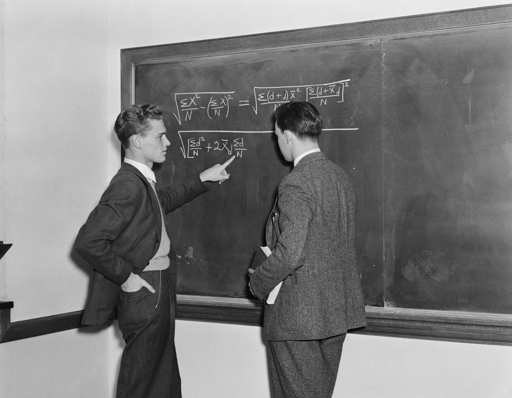 Detail of 2 students professors mathematicians blackboard studying complex equations by Anonymous