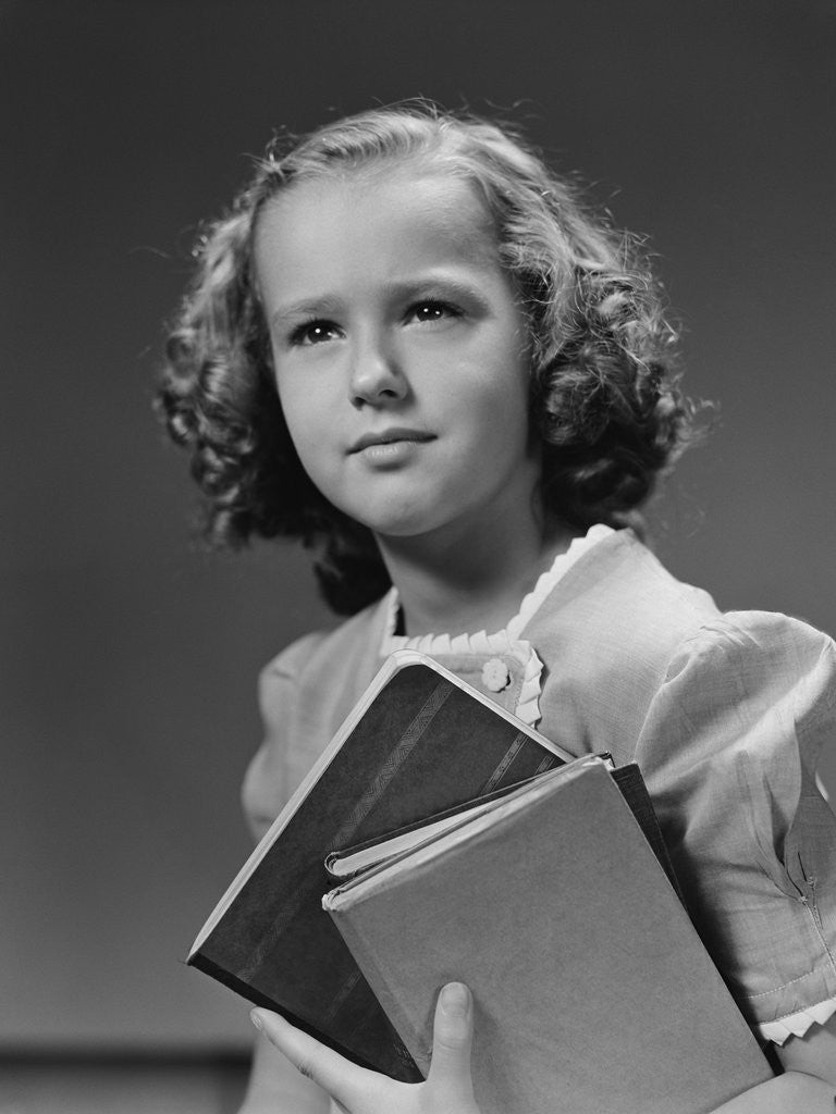 Detail of Portrait serious girl student holding school books by Anonymous