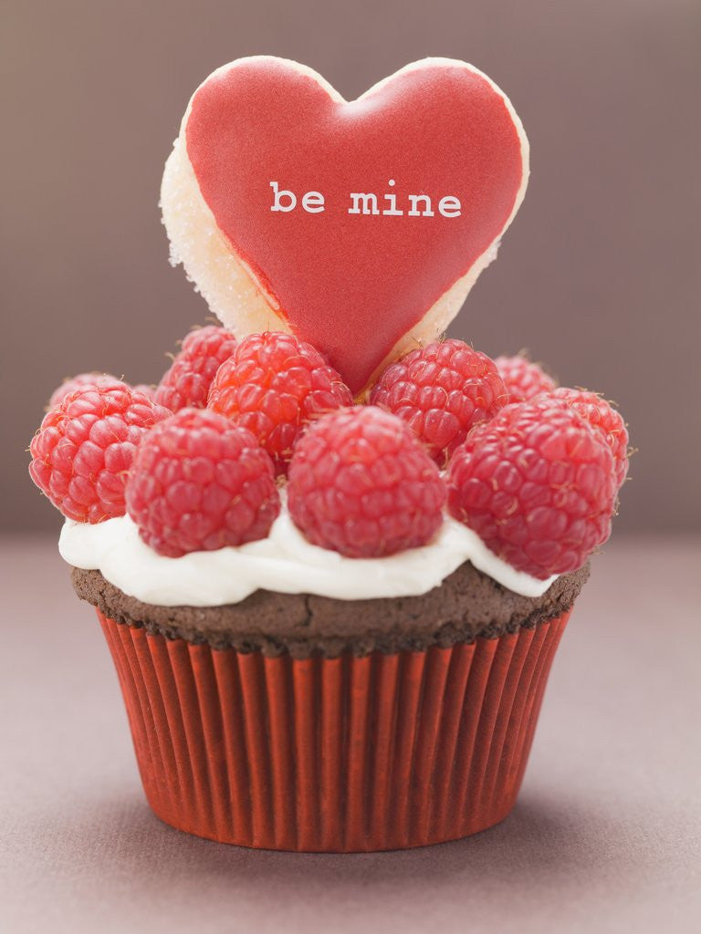 Detail of Chocolate cupcake with raspberries & heart-shaped biscuit by Anonymous