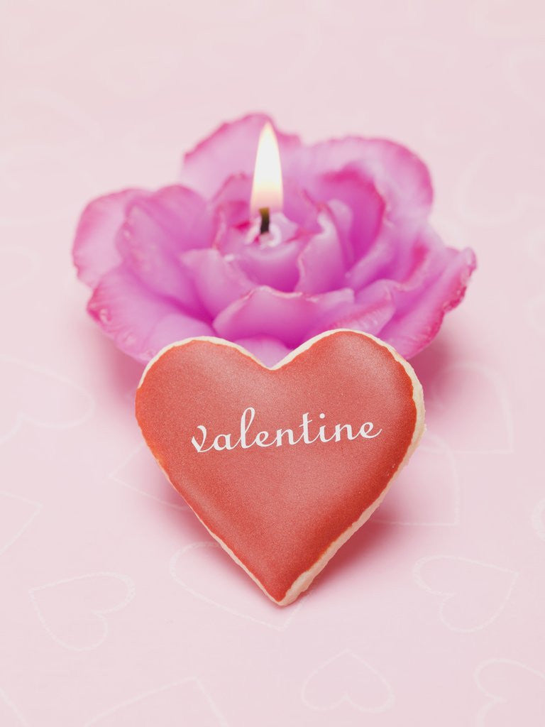 Detail of Valentine's Day biscuit, rose candle by Corbis