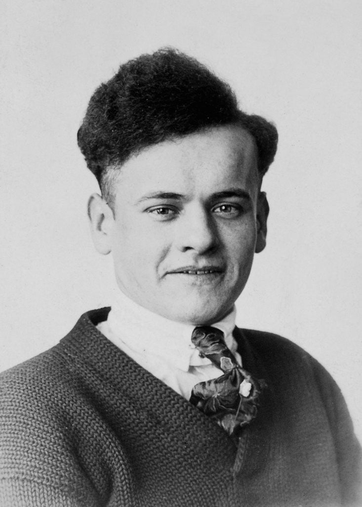 Detail of Young man smiles in a formal portrait, ca. 1920 by Anonymous