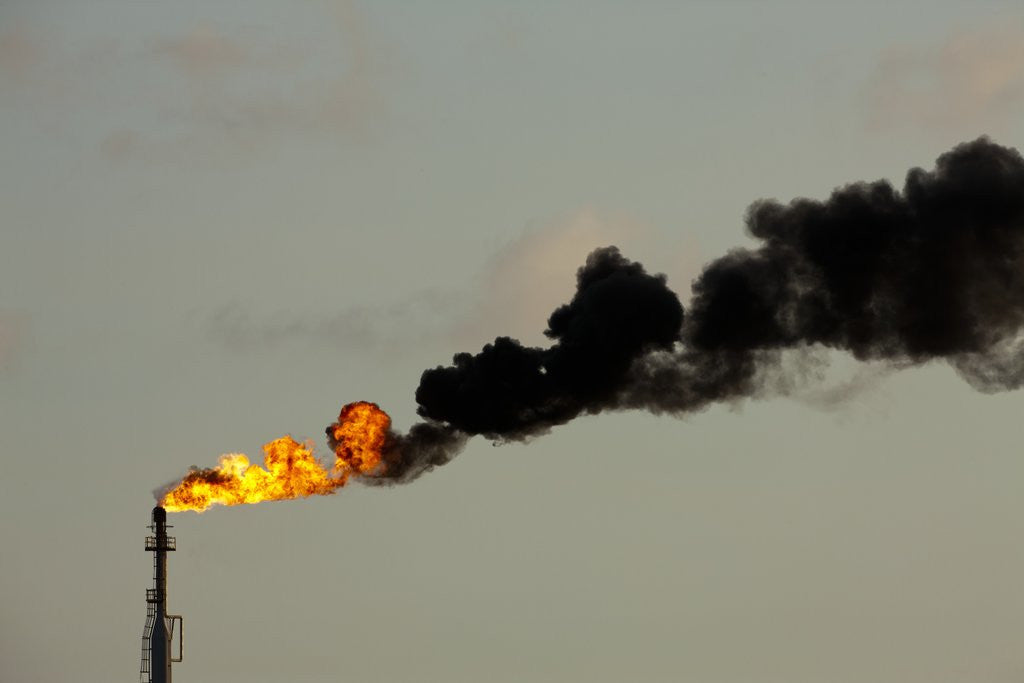 Detail of Flames and smoke billow from natural gas flare at Valero Oil Refinery by Anonymous