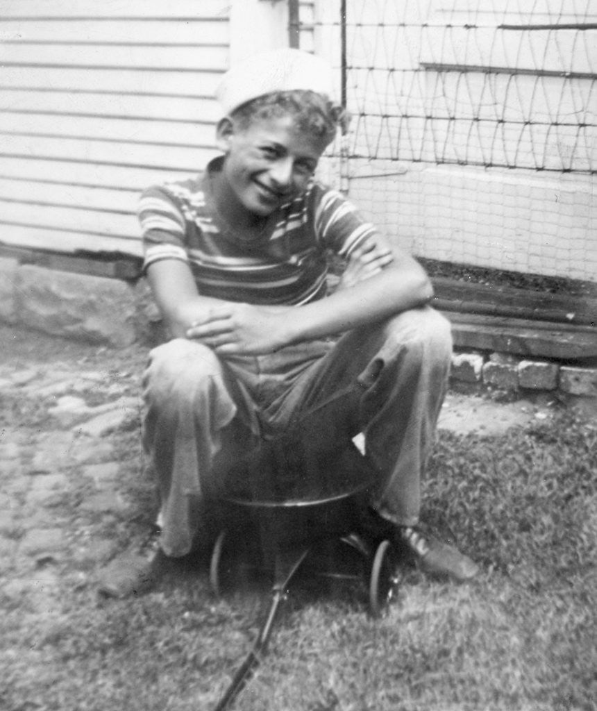 Detail of Boy sitting a very small wagon, ca. 1938 by Anonymous