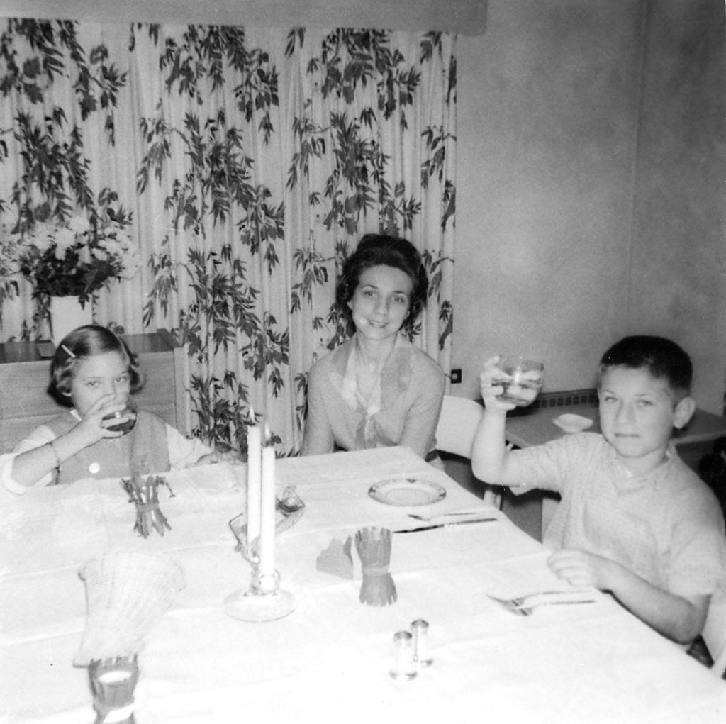 Detail of Mother with children at the dinner table, ca. 1962 by Anonymous