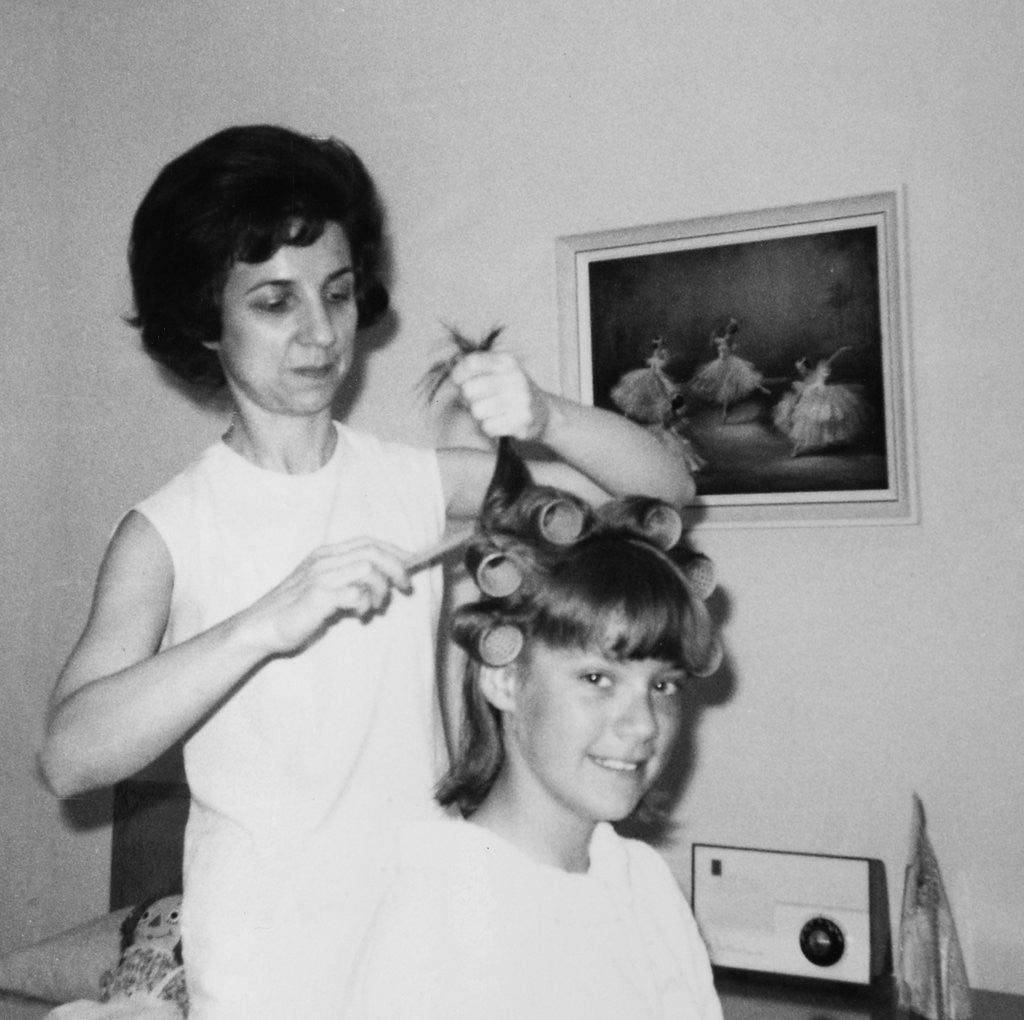 Detail of Mother helps 16 year old daughter get ready for date, ca. 1970 by Anonymous