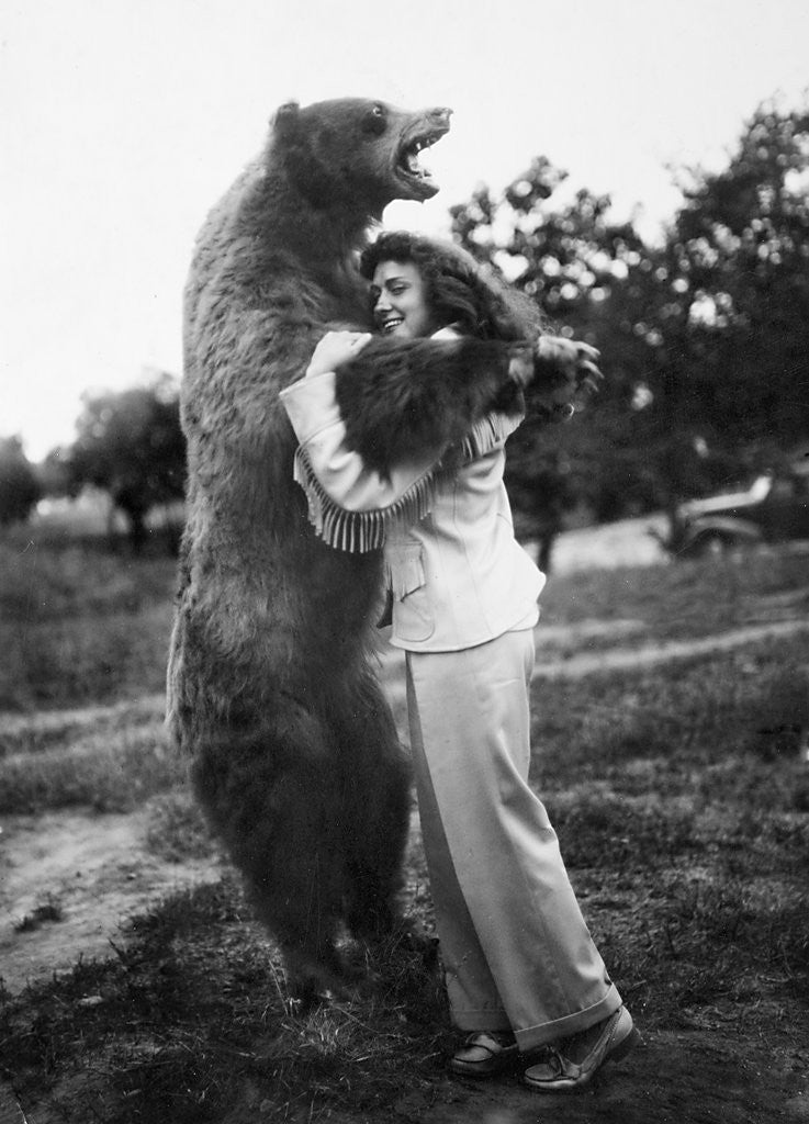 Detail of Woman embraces a stuffed bear, ca. 1940 by Anonymous